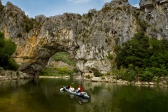 Navigating through the Pont d'Arc on the Ardeche R