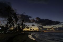 Jupiter and Crescent Moon Rise Above a Setting Sun